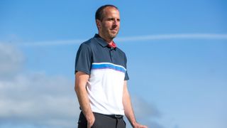 A golfer wears the Abacus Marco Drycool Polo