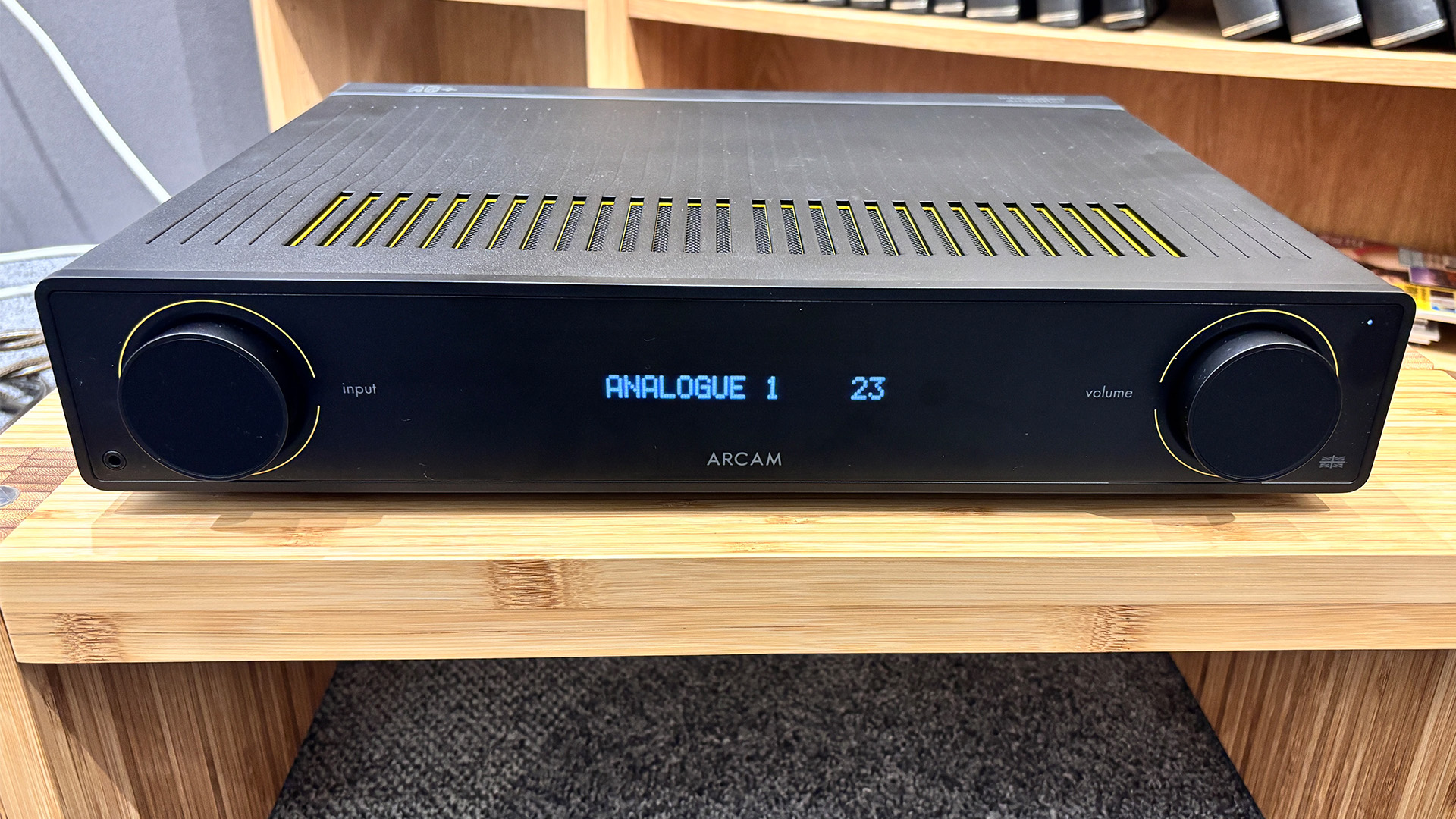 Arcam A5+ integrated amplifier on wooden hi-fi rack