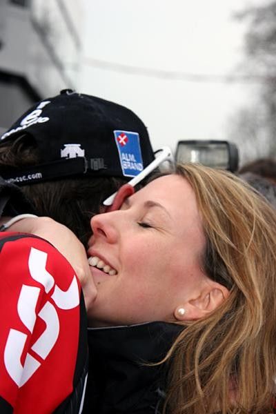 Fr&auml;nk Schleck embraced by his partner.