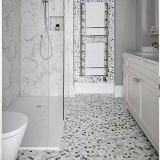 white bathroom with mosaics