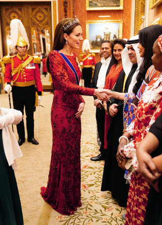 Princess of Wales, greets guests during a Diplomatic Corps reception at Buckingham Palace in London on December 6, 2022