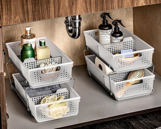 Two two-tier under-sink organizers