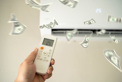 Money comes out of an air conditioner unit as someone adjusts the temperature via a remote.