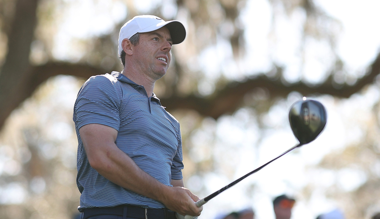 Rory McIlroy watches his tee shot with a driver