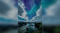 Todd Salat captured auroras over Go&eth;afoss waterfall in northern Iceland on April 14, 2022.