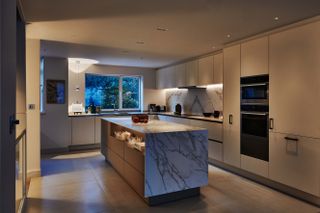 a kitchen island with integrated led lighting