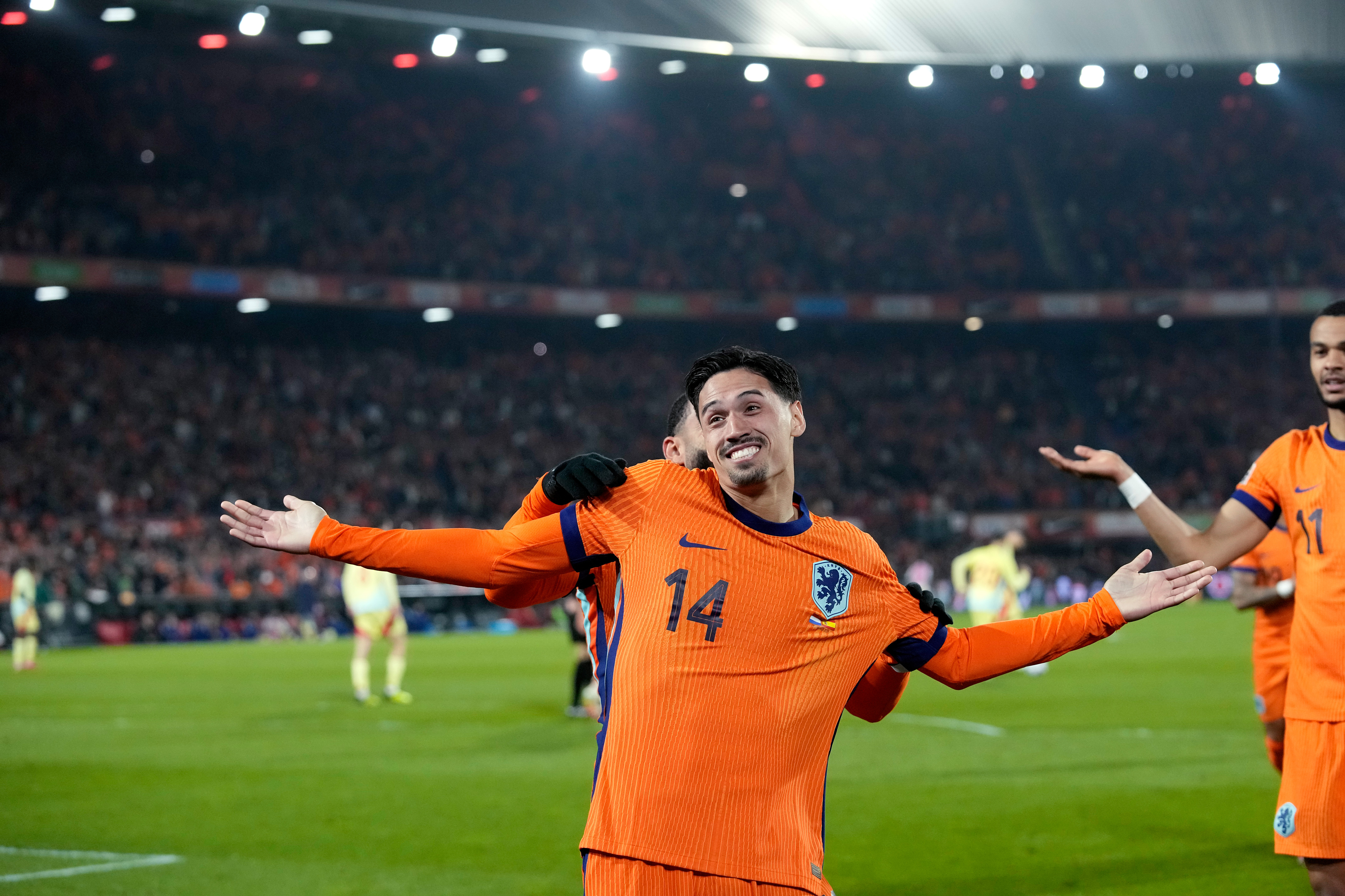 Tijjani Reijnders celebrates scoring against Spain in the Nations League quarter-finals