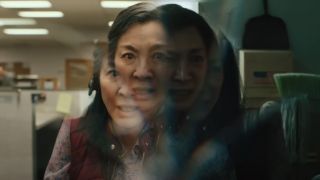 Michelle Yeoh as Evelyn experiencing multiple realities at once in Everything Everywhere All At Once