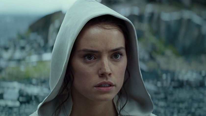 Rey wearing a hood speaking to Luke&#039;s ghost in The Rise of Skywalker.