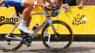 A bike flies past on the Tour de France