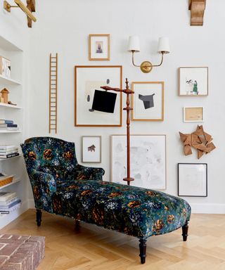 floral patterned chaise lounge with gallery wall