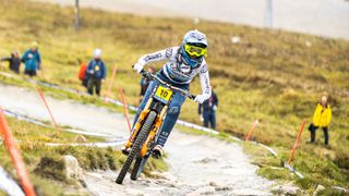 Downhill mountain bike racer at Fort William