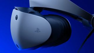 PlayStation VR 2 developer reaction; a VR headset on a blue background