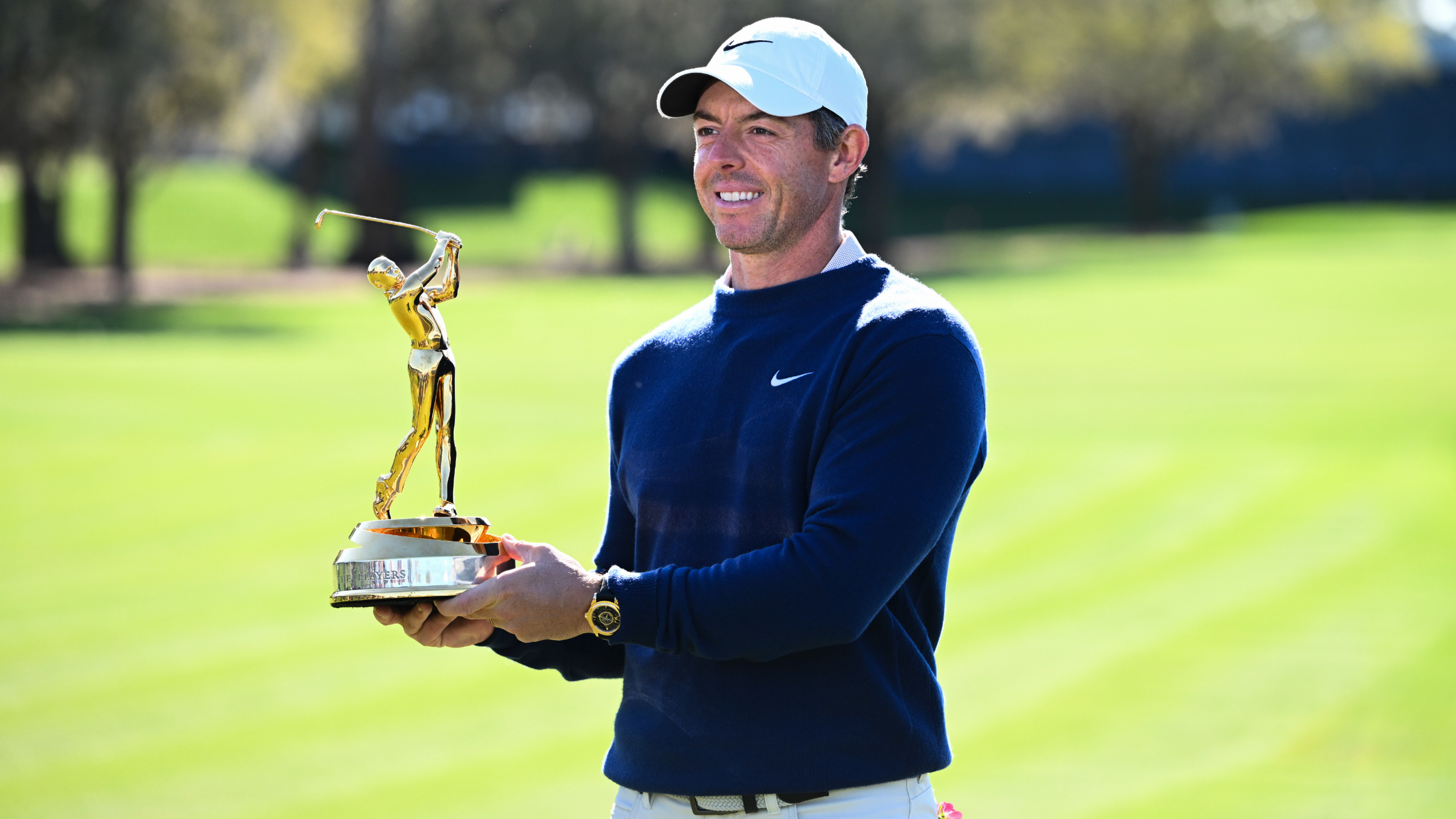 Rory McIlroy with The Players Championship trophy