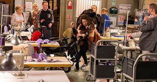 FROM ITV STRICT EMBARGO - No Use Before Tuesday 2 February 2016 Coronation Street - Ep 8834 Monday 8 February 2015 - 1st Ep Eva Price [CATHERINE TYLDESLEY] heads into work early with some food for Marta [EDYTA BUDNIK]. Marta complains that she’s cold and Eva promises to try and find her a coat. In the factory Sean shows off his new coat. However Sean Tully [ANTONY COTTON] is later furious to discover his coat missing. As the factory girls argue about who could have stolen it, Marta suddenly emerges from behind some boxes wearing Sean’s coat and makes a dash for it. Everyone watches open mouthed. Picture contact: david.crook@itv.com on 0161 952 6214 Photographer - Mark Bruce This photograph is (C) ITV Plc and can only be reproduced for editorial purposes directly in connection with the programme or event mentioned above, or ITV plc. Once made available by ITV plc Picture Desk, this photograph can be reproduced once only up until the transmission [TX] date and no reproduction fee will be charged. Any subsequent usage may incur a fee. This photograph must not be manipulated [excluding basic cropping] in a manner which alters the visual appearance of the person photographed deemed detrimental or inappropriate by ITV plc Picture Desk. This photograph must not be syndicated to any other company, publication or website, or permanently archived, without the express written permission of ITV Plc Picture Desk. Full Terms and conditions are available on the website www.itvpictures.com