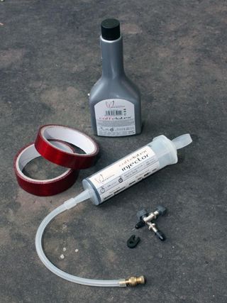 Liquid sealants are easy to inject into a tubular tire as all of the pro-level ones incorporate a removable valve core and dedicated syringes and fittings are readily available.