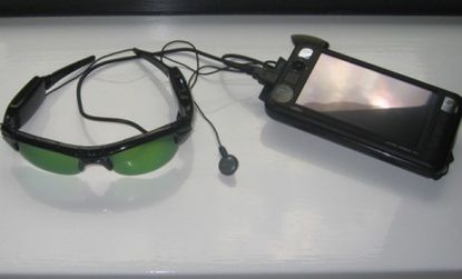 The combination of a special pair of glasses, a webcam, and a smartphone can help the blind "see" again.