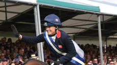 Pippa Funnell, pictured wearing a Champion helmet, winning Burghley in 2019.