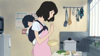 Hana carrying one of her children on her back while preparing food in Wolf Children