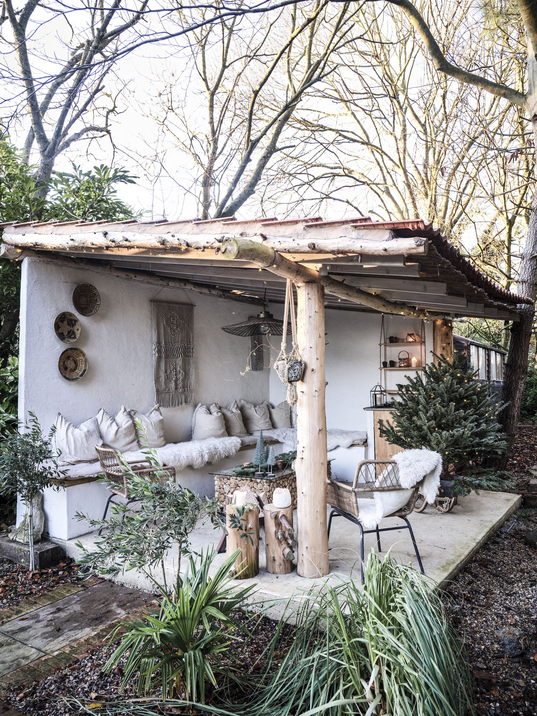 outdoor room shelter with seating and christmas styling