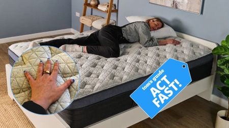 The image shows a mattress tester lying on her side on a white mattress with a dark blue trim, set inside a blue bedroom. An inset image shows the close up of a manicured hand on the mattress' surface. 