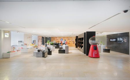 Retail shop space in the museum with items for sale displayed on shelves, walls and display tops