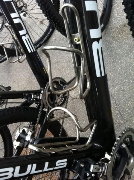 Team Bulls runs the best bottle cages in the world. Handmade by Ron Andrews in Durango, the titanium King Kage!