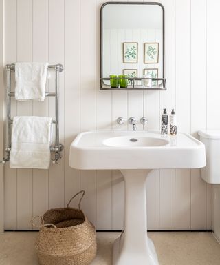 white country bathroom in 19th century Dorset barn conversion with colorful interior