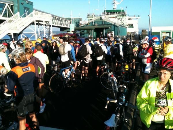 Riders in the Echelon Gran Fondo take a ferry to get to the start in Kingston, Washington.