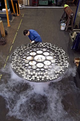 Man working on developing a multi circle table