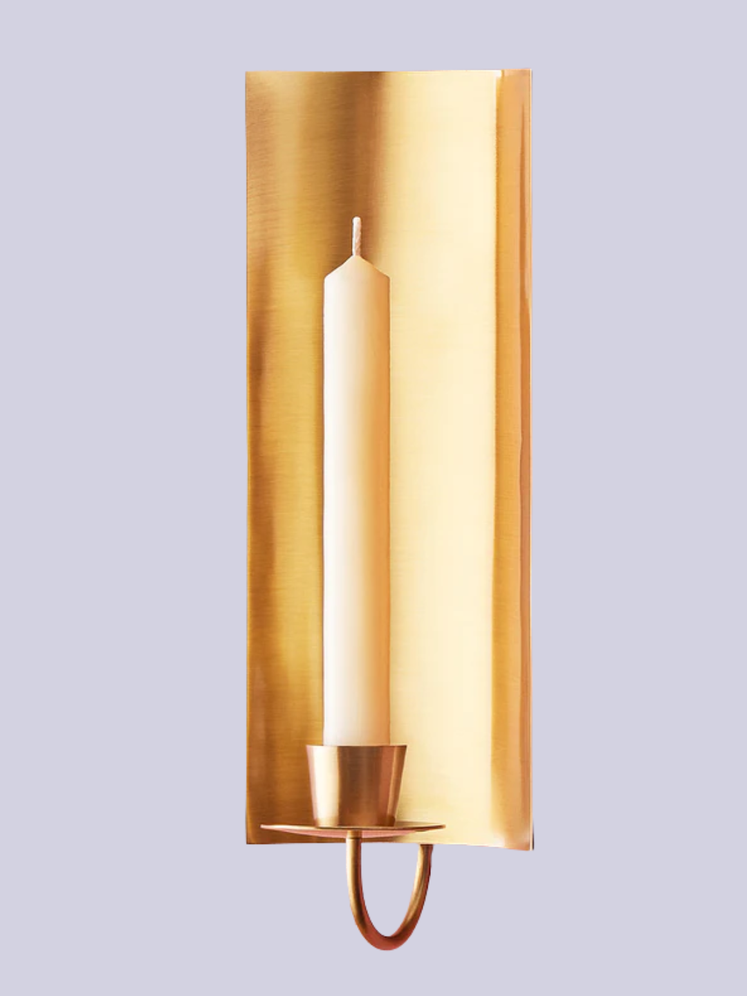 A wall-mounted gold candle holder