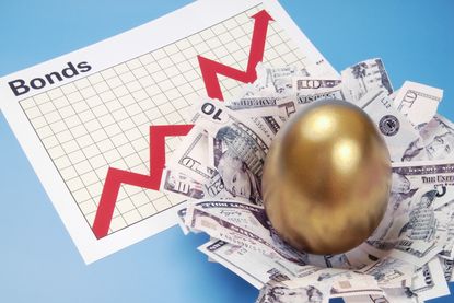 Gold egg sitting in nest of dollars with the word BONDS on a data chart in the background