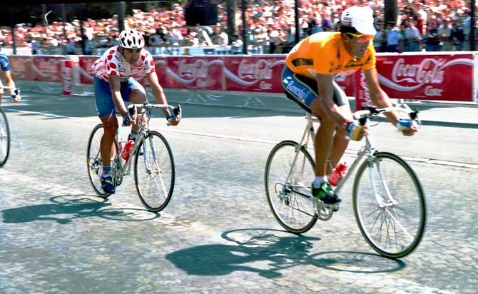 Miguel Indurain and mountains winner Claudio Chiapucchi complete the 1992 Tour on the Champs Elysees.