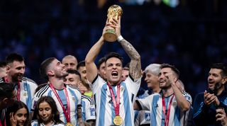 Lautaro Martinez of Argentina lifts the World Cup trophy after Argentina beat France in the final of the FIFA World Cup 2022 at the Lusail Iconic Stadium in Lusail, Qatar on 18 December, 2022.