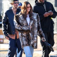 Hailey Bieber wore a dramatic Saint Laurent coat to Super Bowl 58.