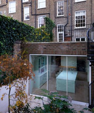 lower ground brick home extension with roof terrace