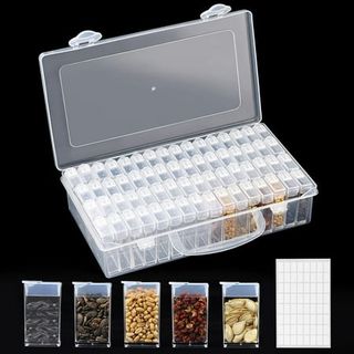 A clear plastic seed storage box with 64 individual boxes and labels. 