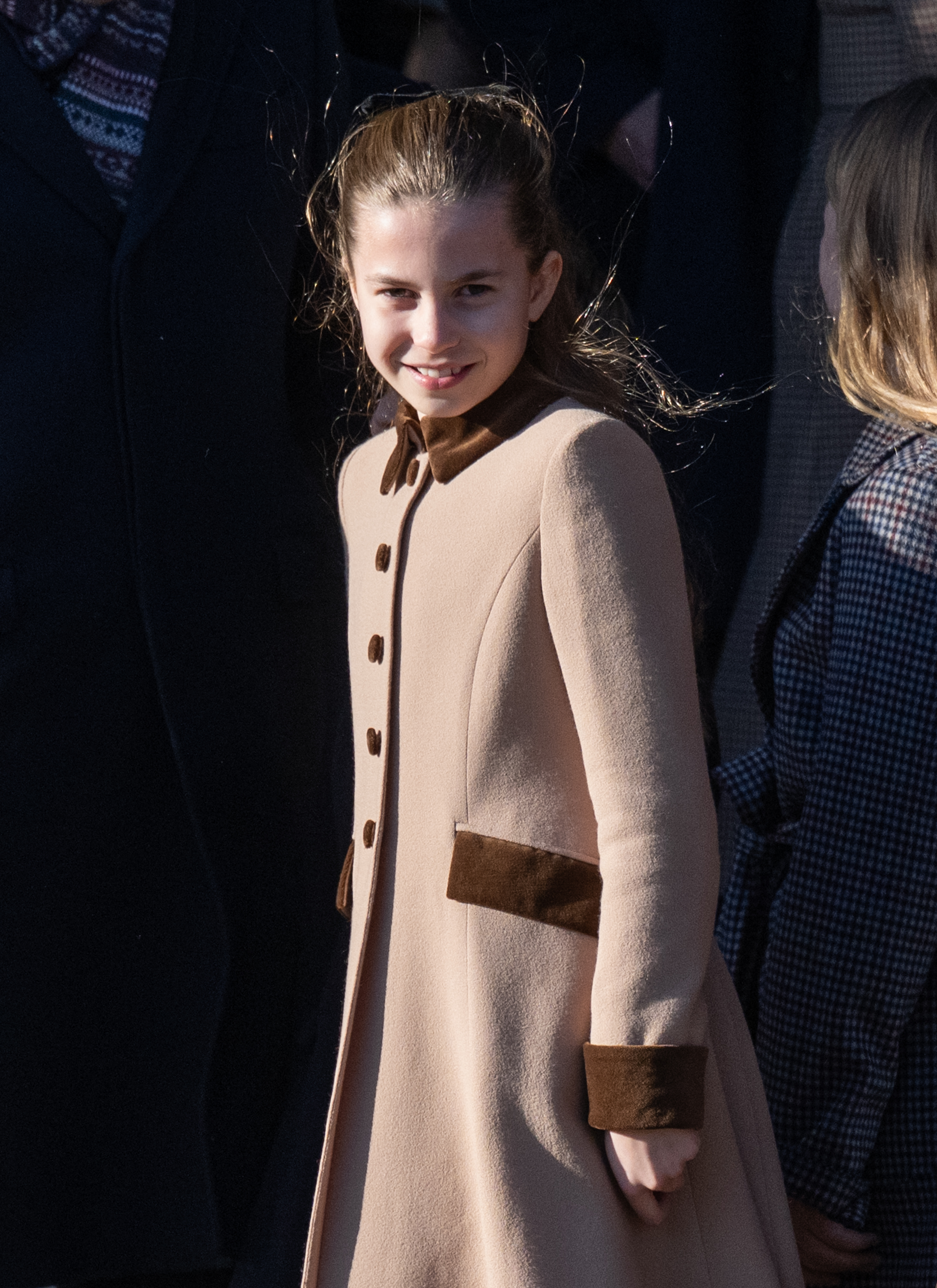 Princess Charlotte wearing a tan coat