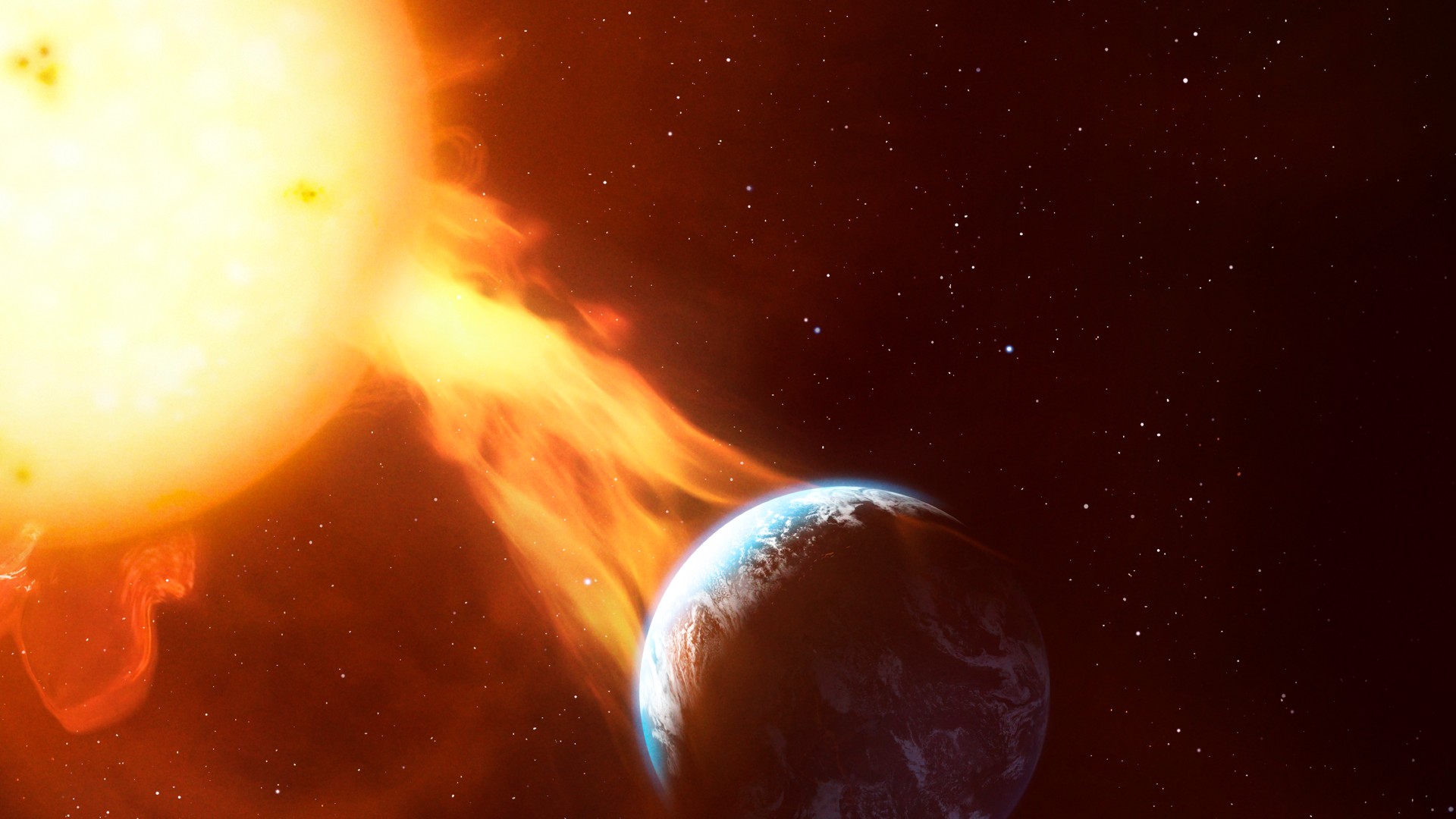 a fiery star sends out a tendril of flame towards a blue and white planet