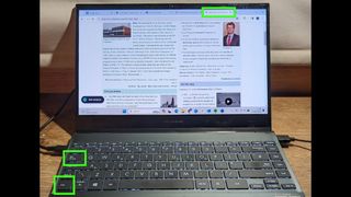  How to switch tabs in a web browser - Photo of a laptop with keys and browser tab highlighted