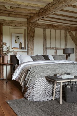 Rustic bedroom with wooden beams