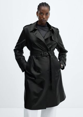 model wears leather trench