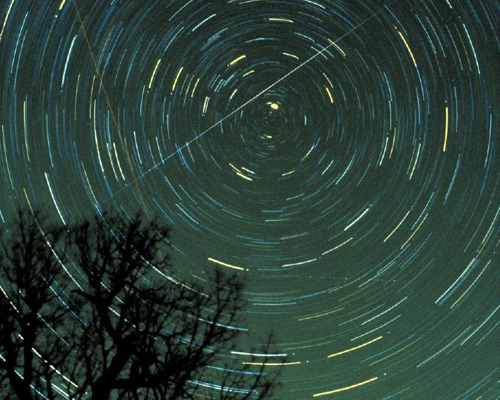 Star trails and a Geminids meteor over Georgia in 1985.