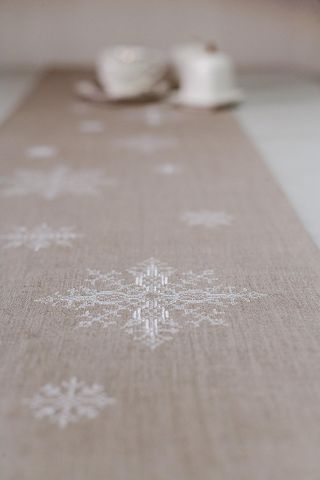 Grey Christmas table runner on dining table