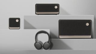 Edifier ES Series speakers and headphones on a display stand that puts them all at different heights.