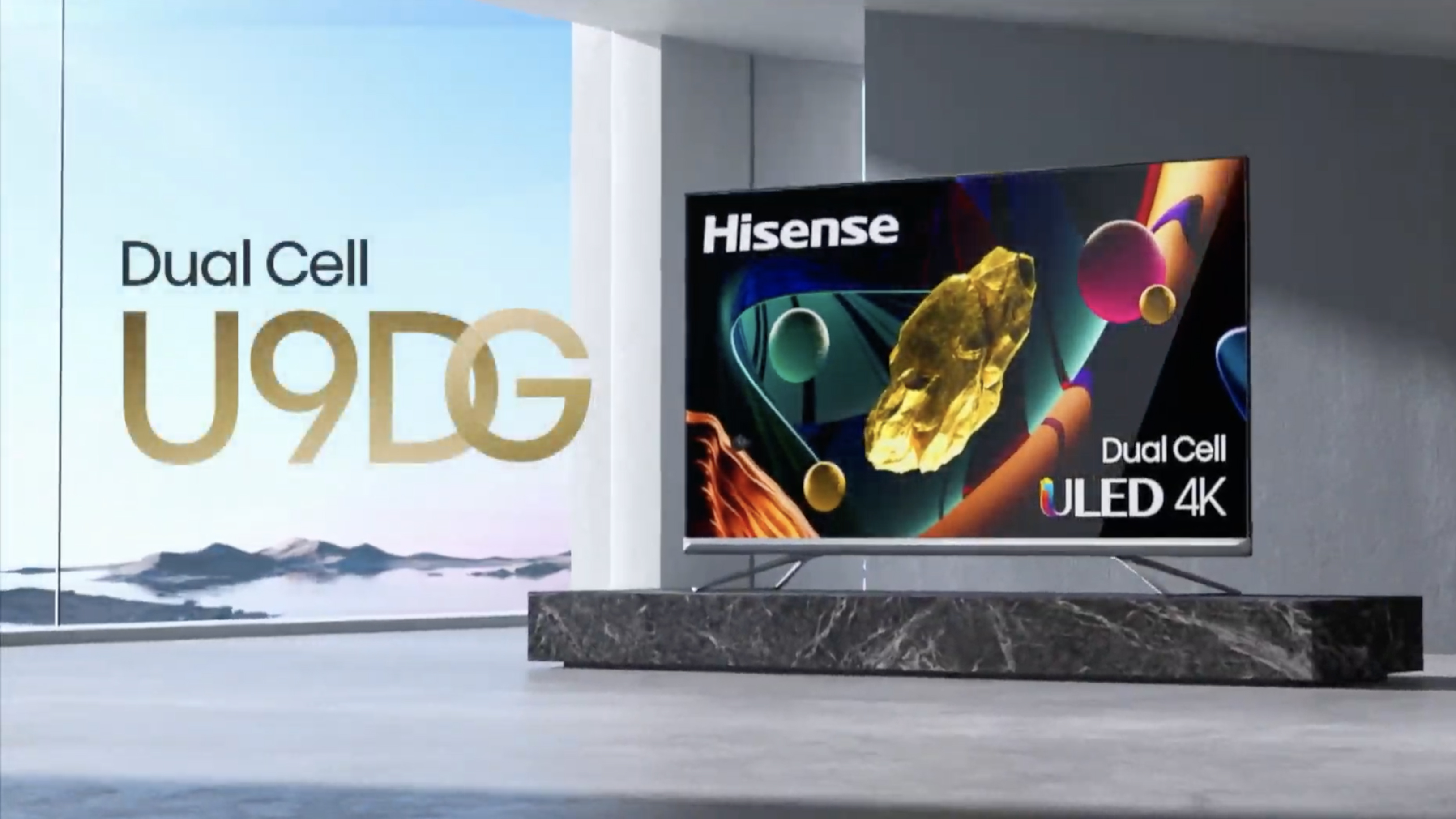 The Hisense U9DG TV hanging in a grey living room