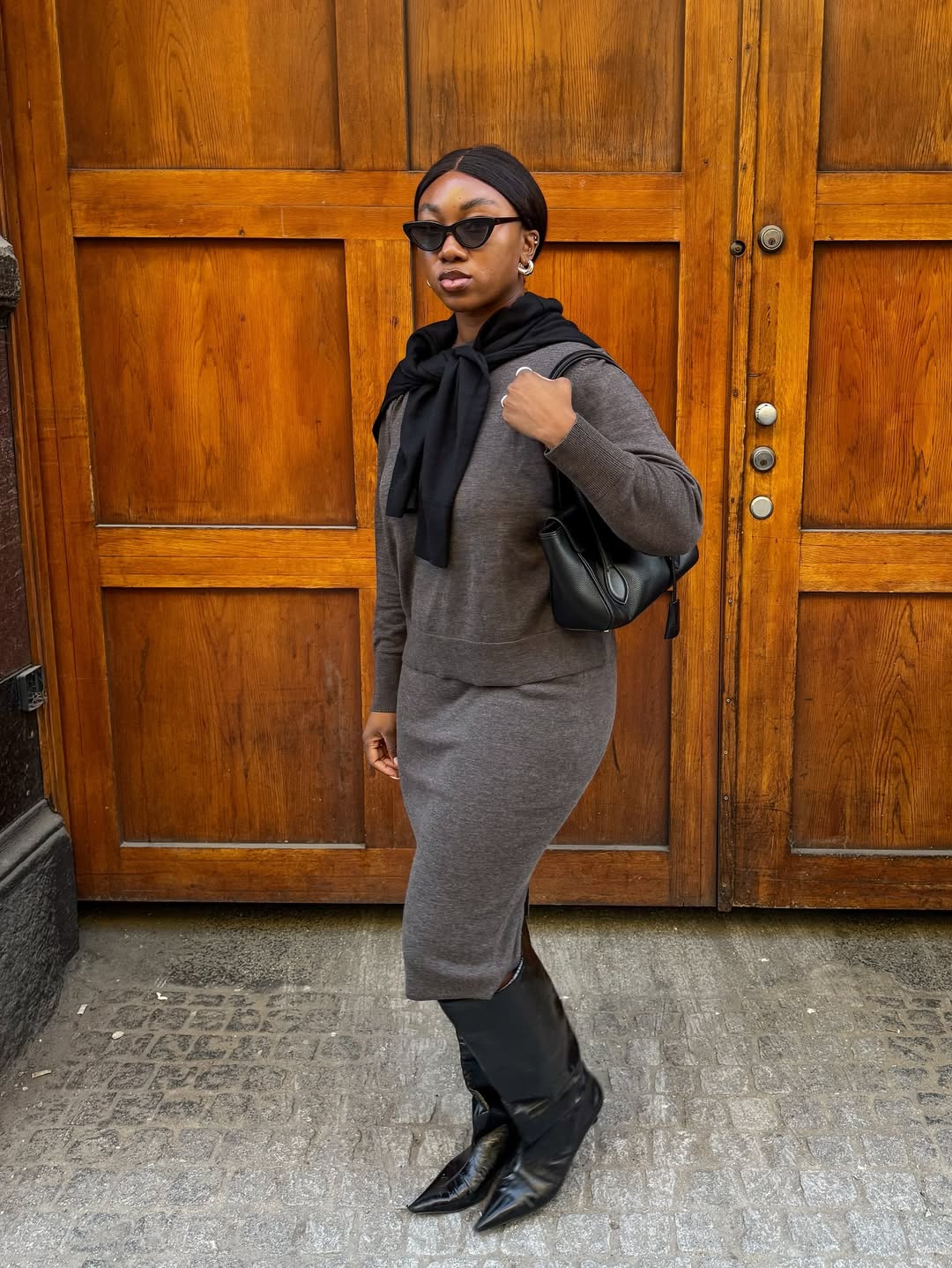 @nnennaechem wears grey cashmere skirt and top