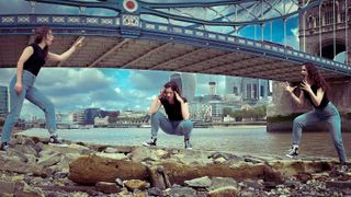 Woman in three poses under tower bridge in London