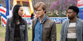 lucas till's macgyver with partners at a town festival on macgyver