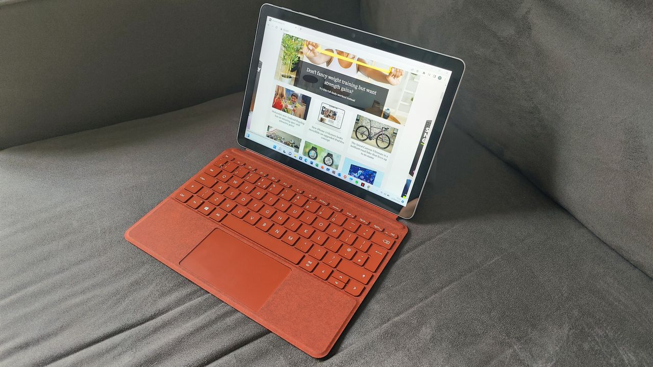 Microsoft Surface Go 3 review: tablet with magnetic keyboard attached in red